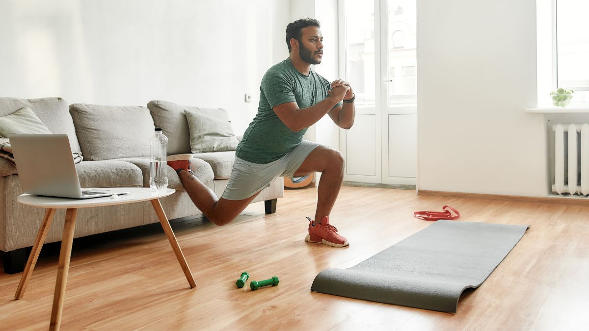 Man doing an at-home workout in his living room